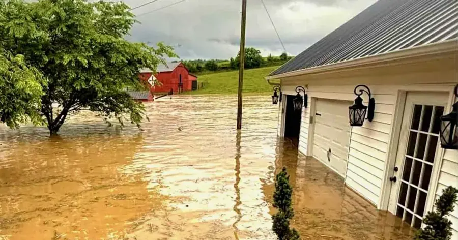 Floodwater surrounding a Middle Tennessee home and garage after heavy rain